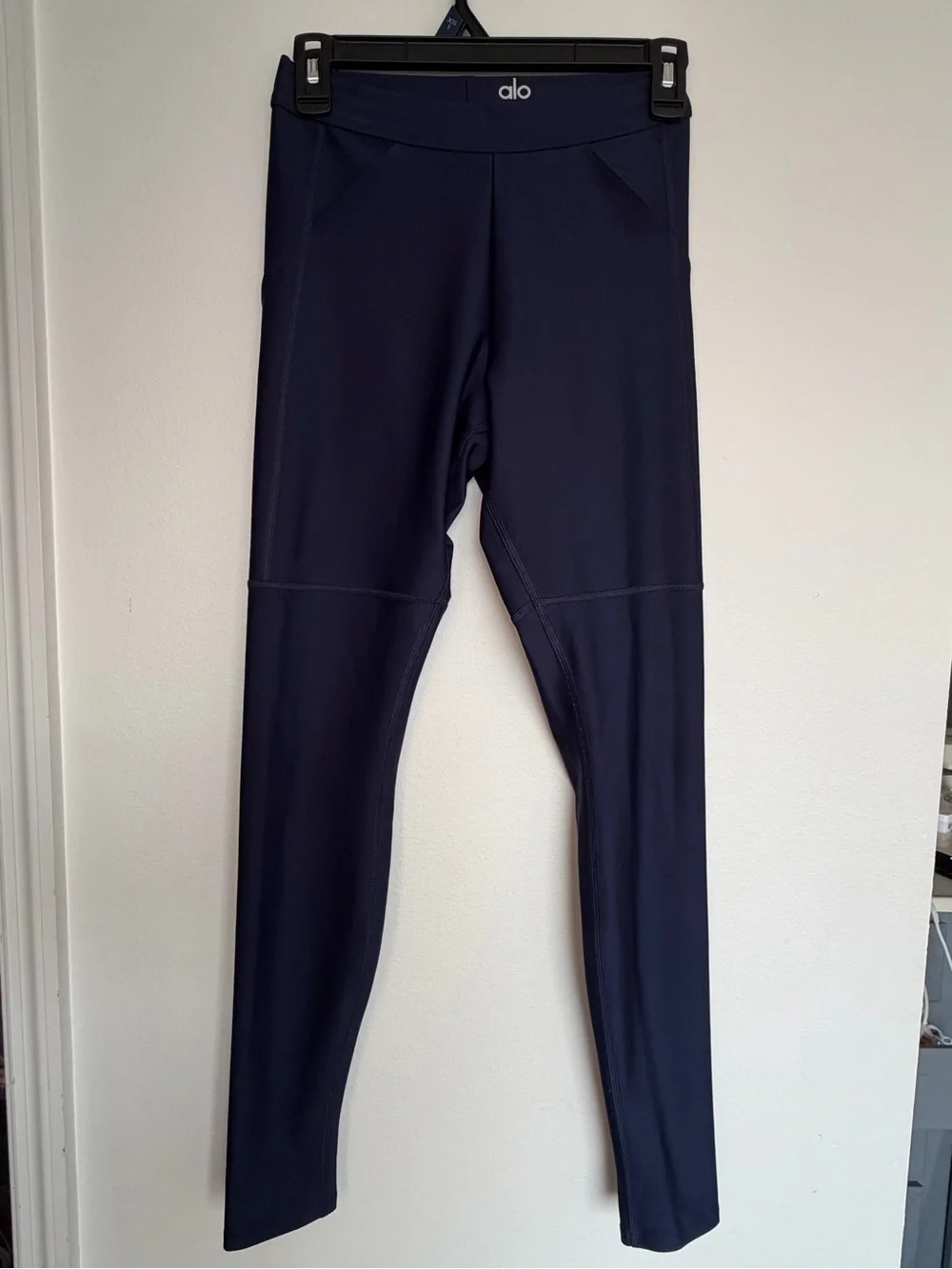 Alo Yoga High-Waist Airlift 4 Pocket Utility Leggings in a dark navy blue color.